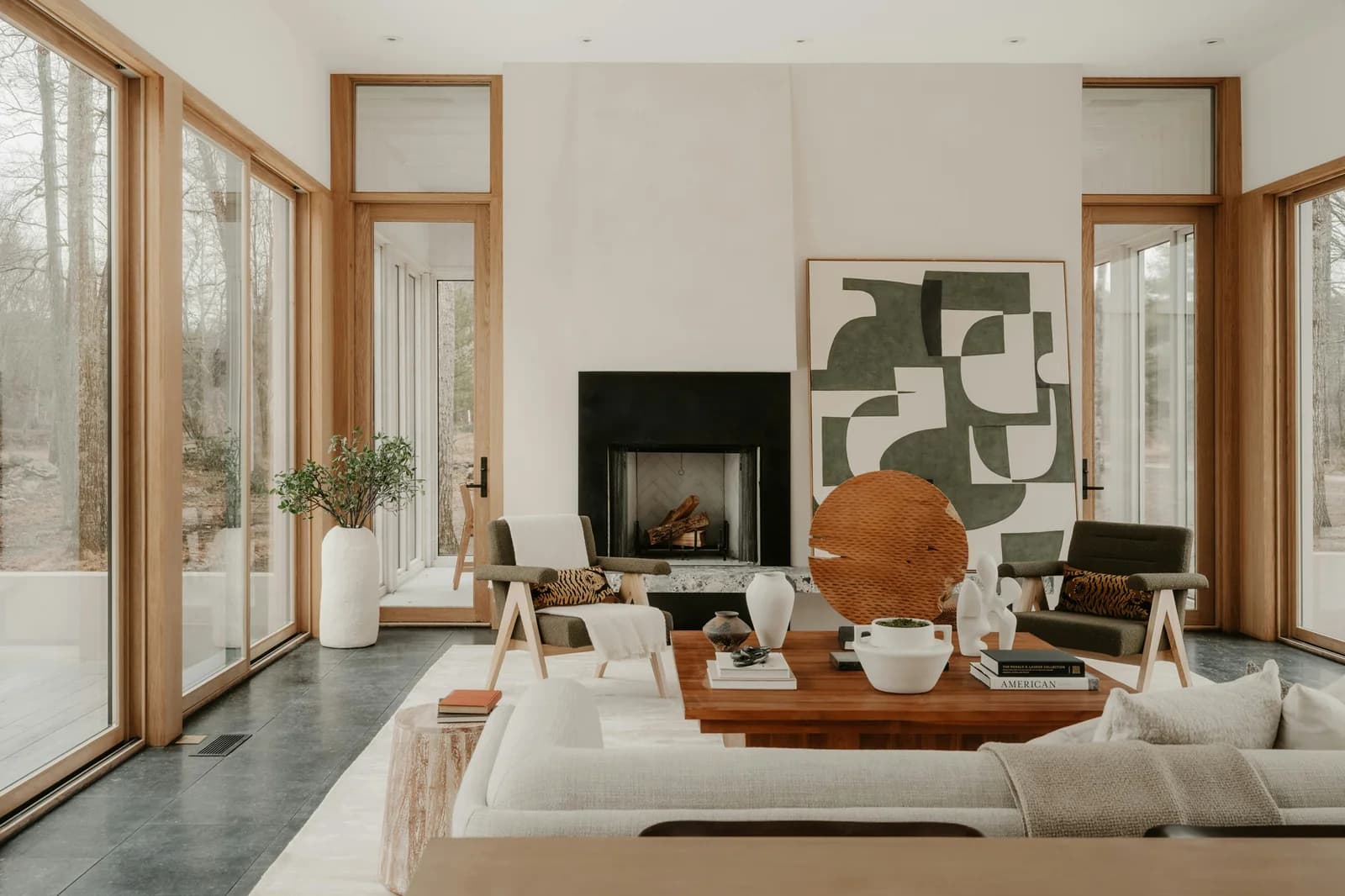 Neutral modern living room featuring designer recommended furniture and clean white sofas.